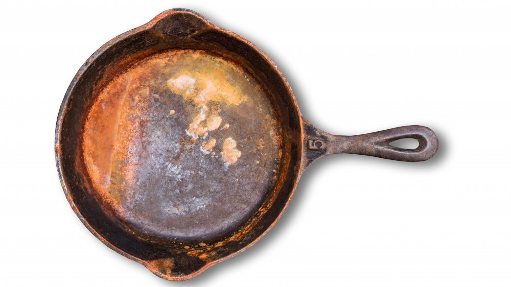 Rusty cast iron skillet