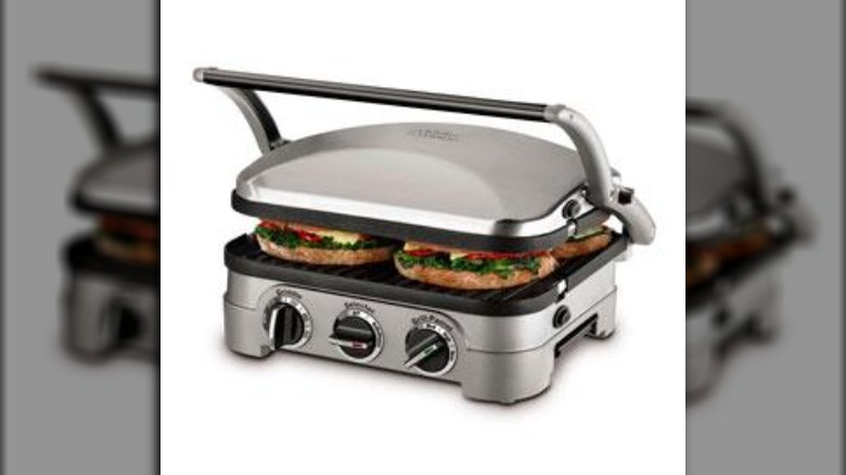 A Cuisinart GR-4NP1-5in-1 Griddler making a panini