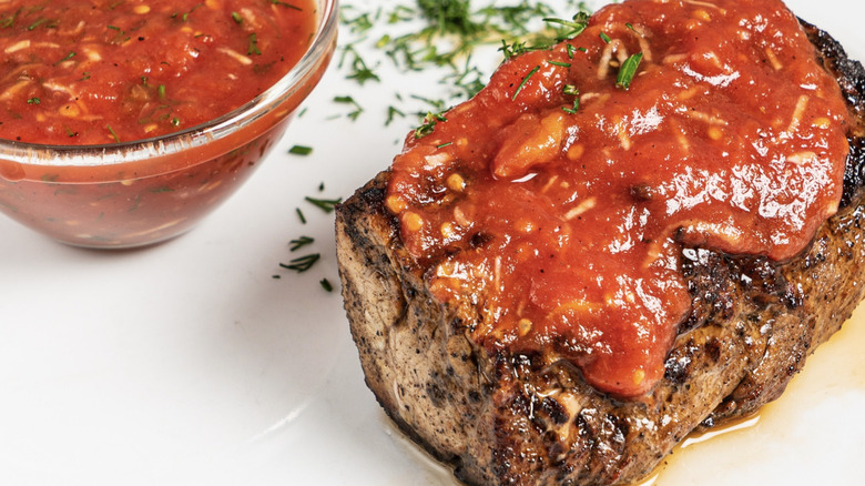 Filet steak with tomato sauce