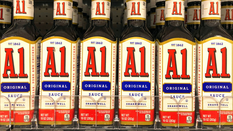 Row of A1 steak sauces with white labels