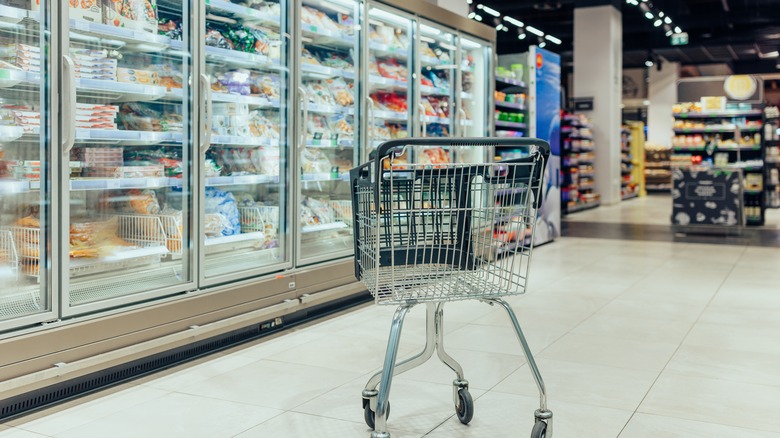 Empty cart by freezers