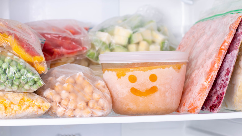 Food in freezer with smiley face on food container