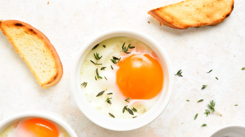 Ramekin of eggs en cocotte