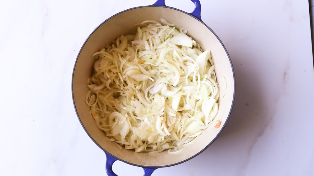 Uncooked onions in a dutch oven pot