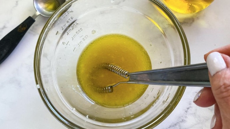 mixing dressing in small bowl