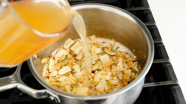 broth poured into pot