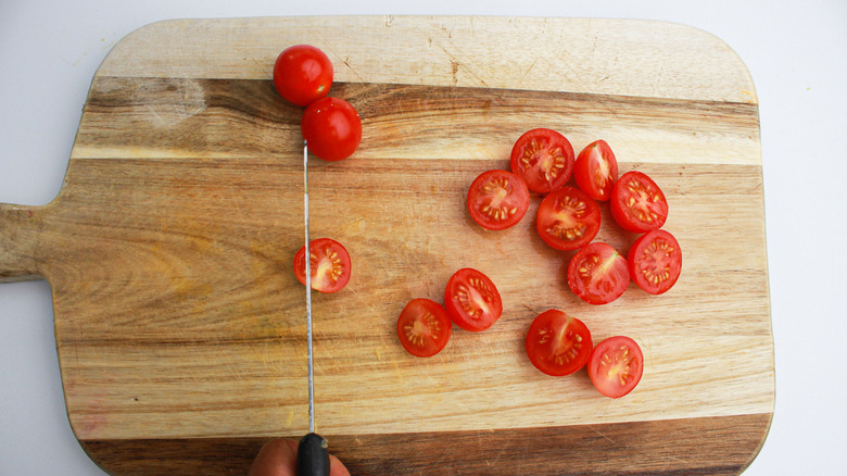 Cherry tomatoes on a cutting board