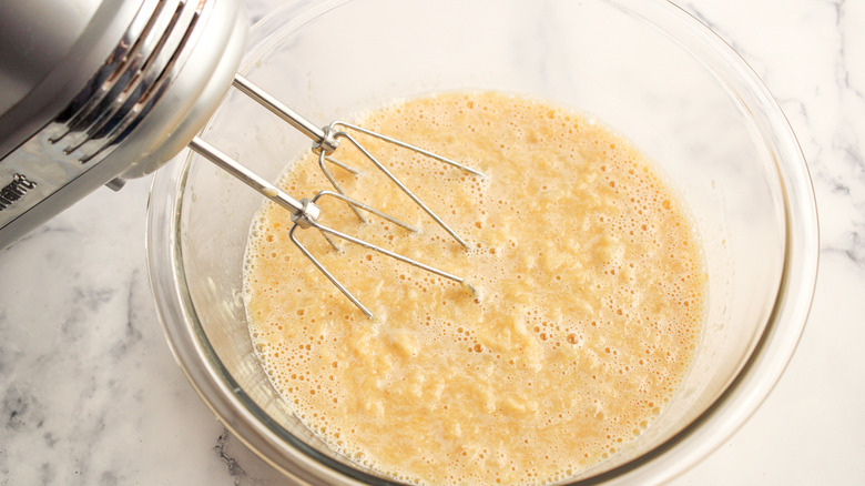 Blending ingredients for the bread in a mixing bowl