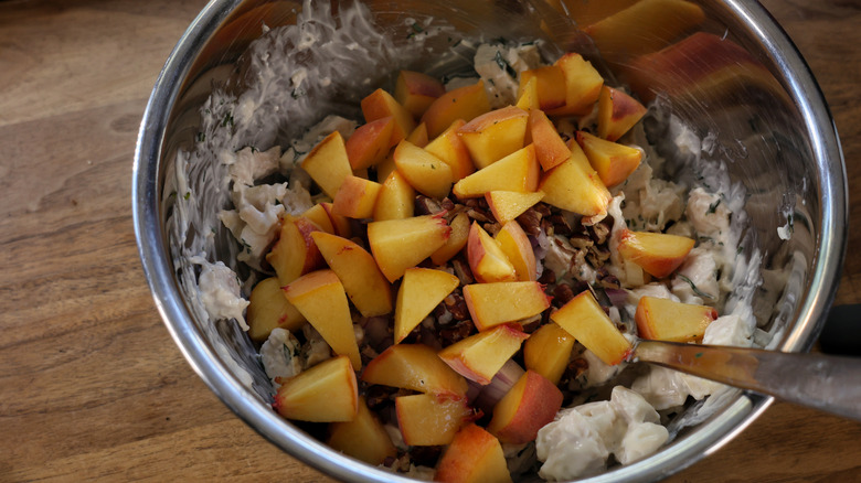 bowl of chicken salad with peaches