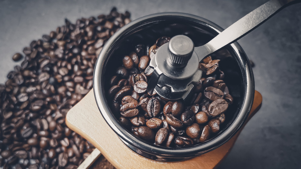 Freshly grinding coffee beans for cold brew