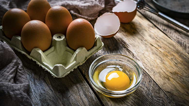 cracked egg in ramekin