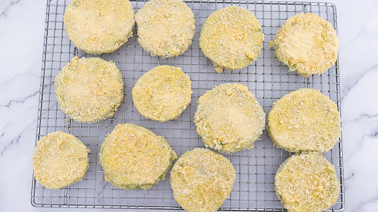 breaded tomato slices on rack