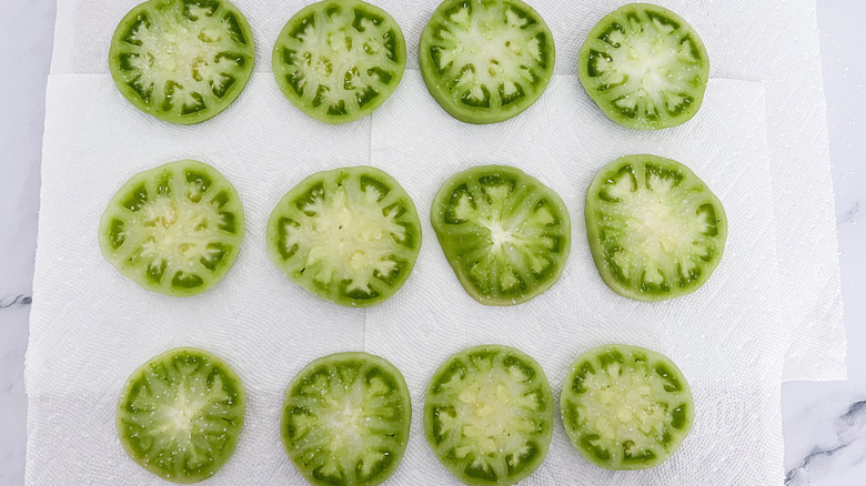 sliced green tomatoes on counter