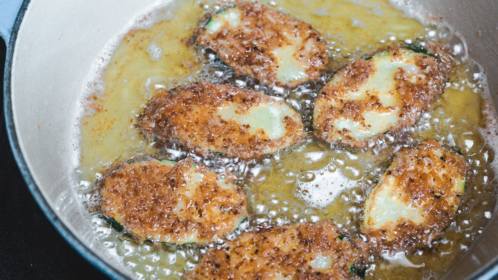 frying zucchini slices