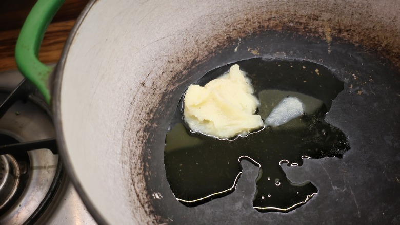 beef tallow melting at bottom of Dutch oven