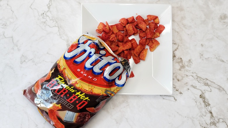 hot Fritos spilling on plate