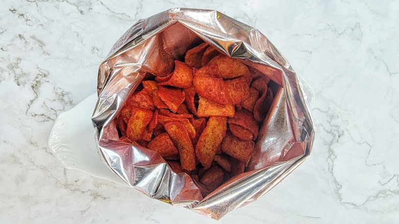 open bag of hot Fritos