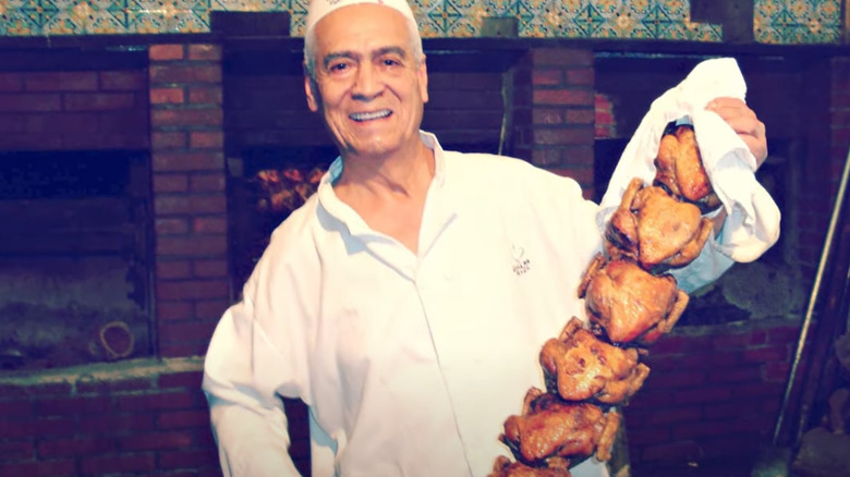 Roger Schuler holding chickens