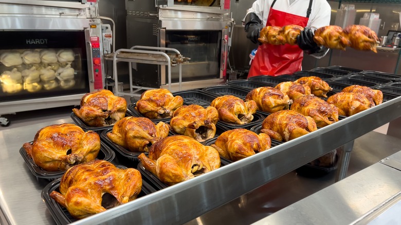 costco worker preparing chicken