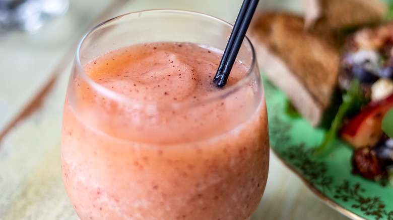 Frose in glass with straw