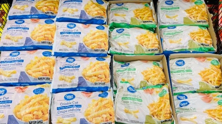 Bags of varieties of Great Value frozen fries at store