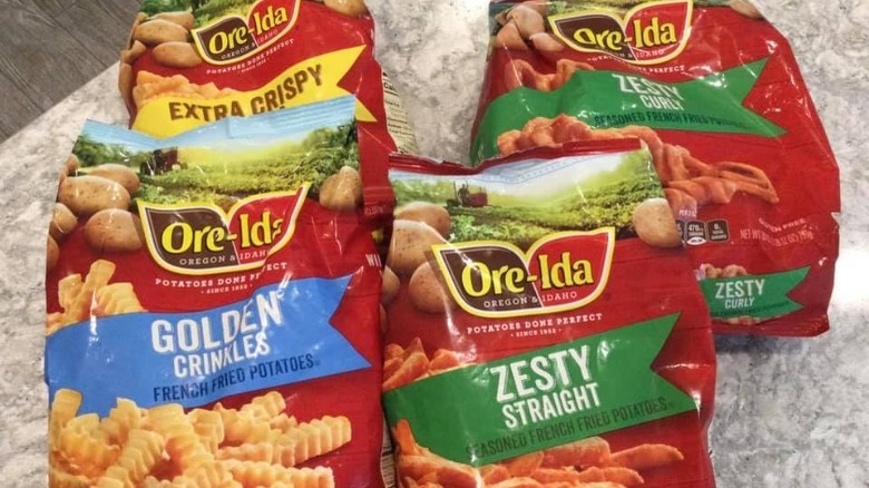 Bags of different kinds of frozen Ore-Ida fries