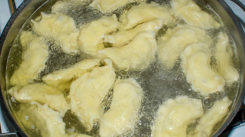 pierogi boiling in pot