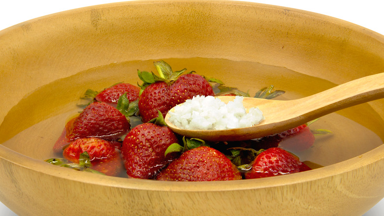 Strawberries in water with salt