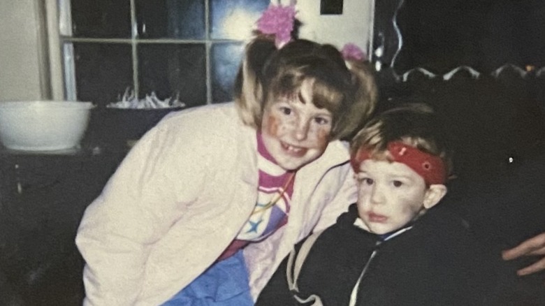 Author as Rambo posing with sister