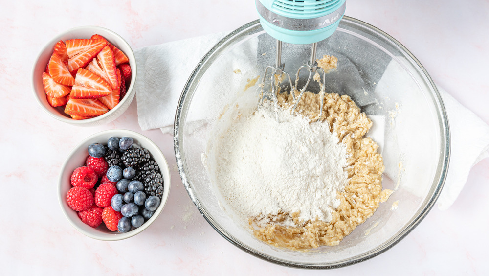 making cookie dough for fruit pizza