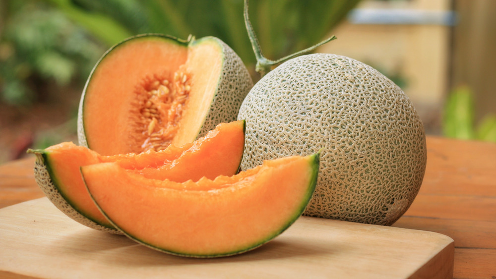 cantaloupe cut open on a table