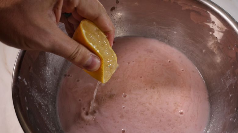 squeezing lemon into cereal milk