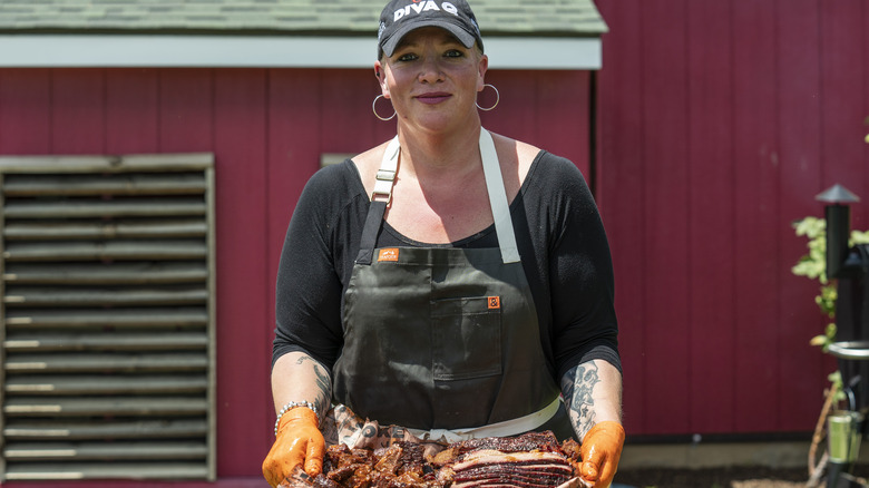 Danielle Bennett carrying meat