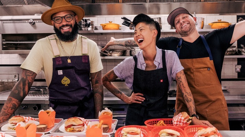 Jeremy Ford, Justin Suthernland and Kristen Kish posing