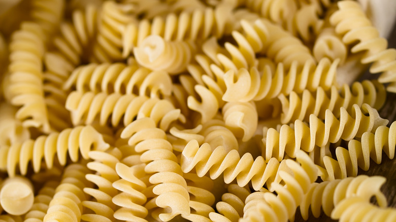 fusilli spilling out of a canvas bag