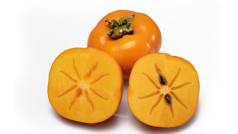 Fuyu persimmon whole and sliced 