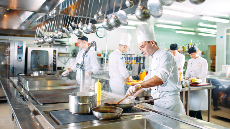 Kitchen and chefs in white coats