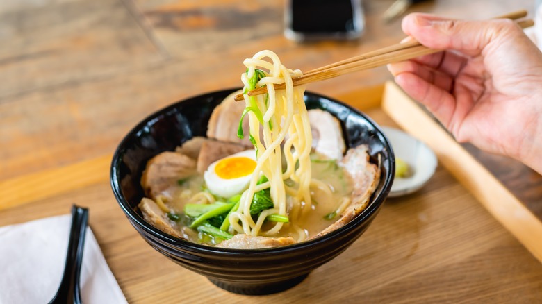 Black bowl of ramen