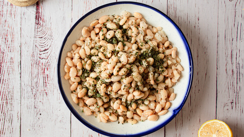 beans in plate with oregano and lemon