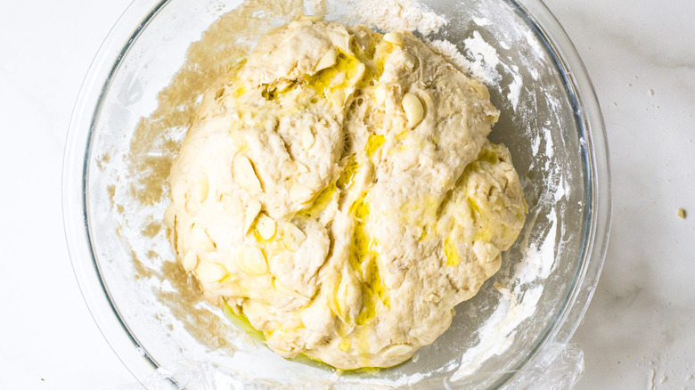 risen dough in a bowl