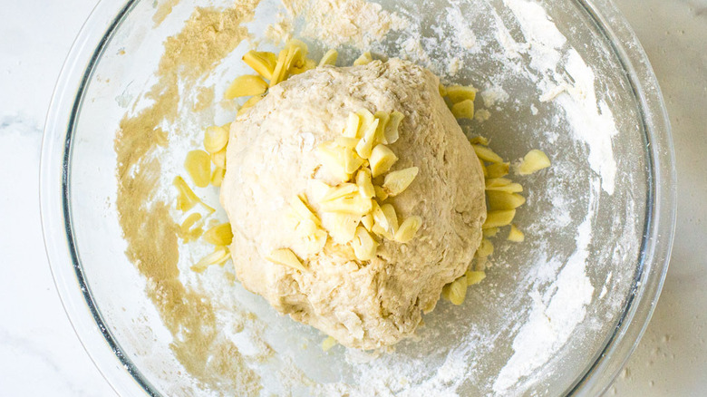 garlic on dough in bowl