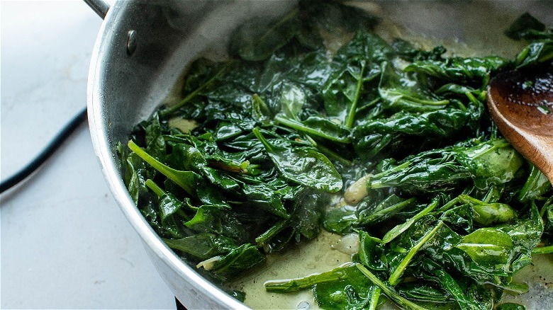 wilted spinach in skillet