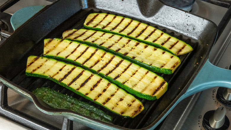 zucchini in pan on stove