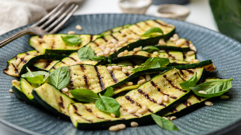 cooked zucchini strips on plate