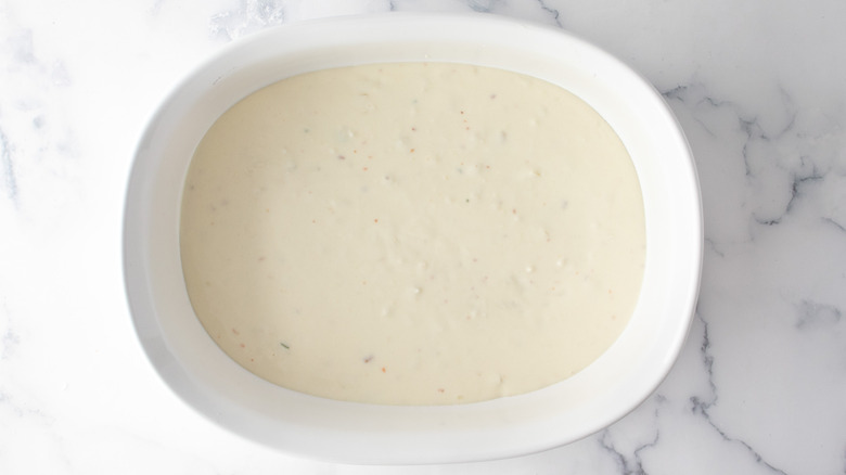 Alfredo sauce in baking dish