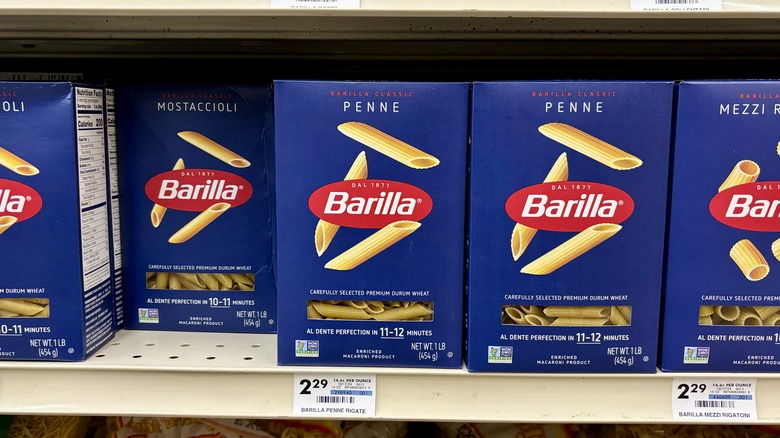 A store shelf stocked with Barilla pasta