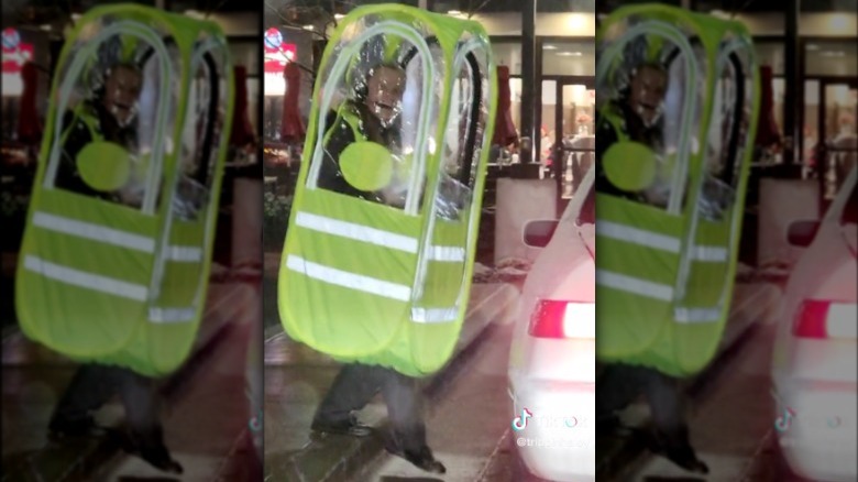 Chick-fil-A employee in a weather pod