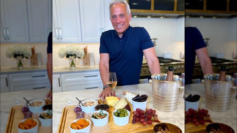 Zakarian with glass of white wine