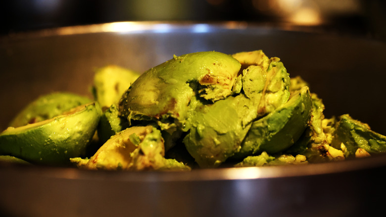 Smashed avocados in a bowl