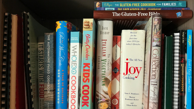 collection of cookbooks on a shelf